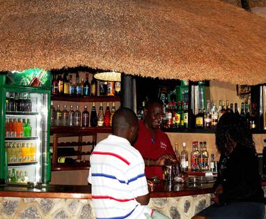 Makuzi_Beach_Lodge_-_Enjoying_the_bar