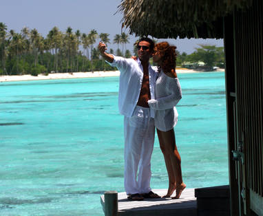 MOZ_Sofitel_Moorea_Couple_on_Deck_(Gregory_Le_Bacon_2006)